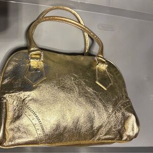Noir Elegant Gold Leather Handbag